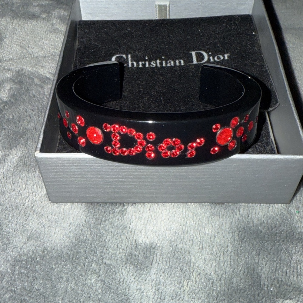 Preloveded Christian Dior bangal black with red rhinestones size is 6.5”